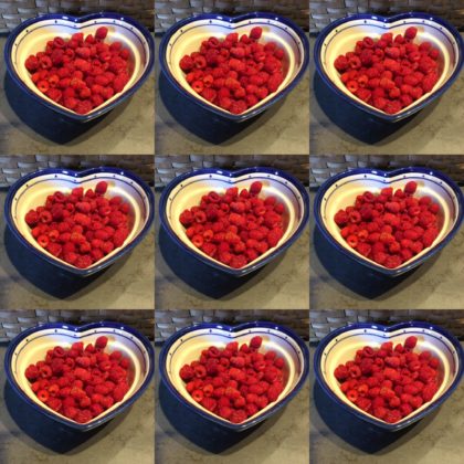 raspberries in 9 heart shaped bowls