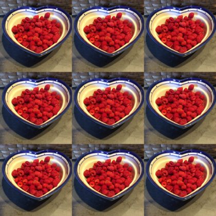 raspberries in 9 heart shaped bowls