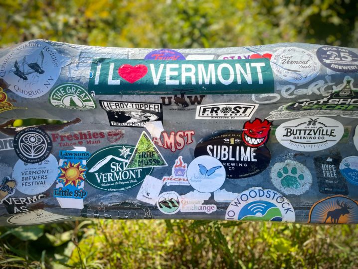 Collection of stickers, mostly Vermont. advertising beer, skiing