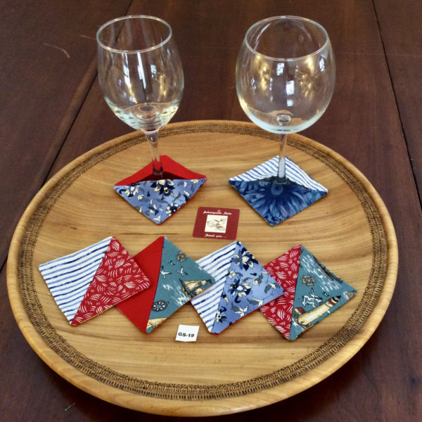 6 red, white and blue fabric glass slippers displayed w 2 wine glasses