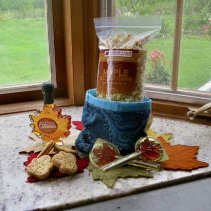 turquoise satchel, maple syrup, pops, popcorn, cookies