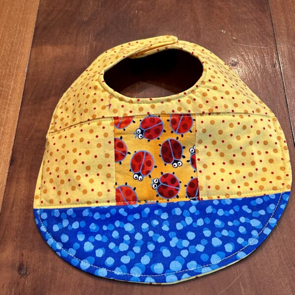 quilted baby bib lady bugs yellow blue